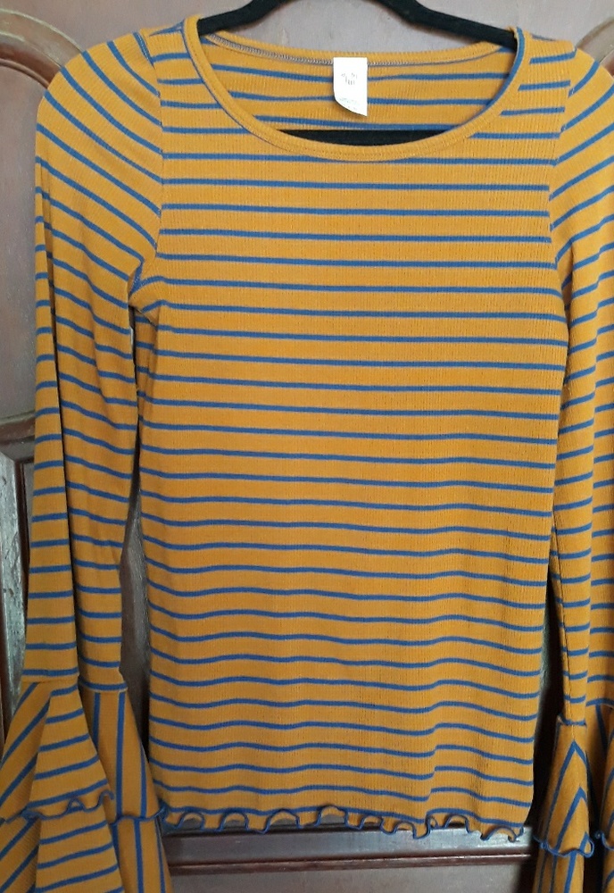A We the Free sweater. In mint condition